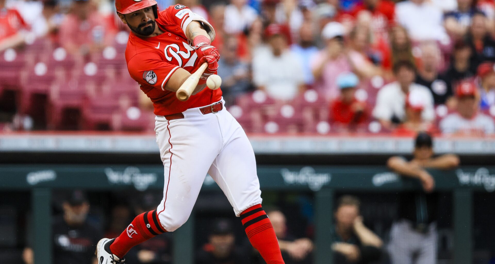 Encarnacion-Strand injects uncertainty into Reds IF