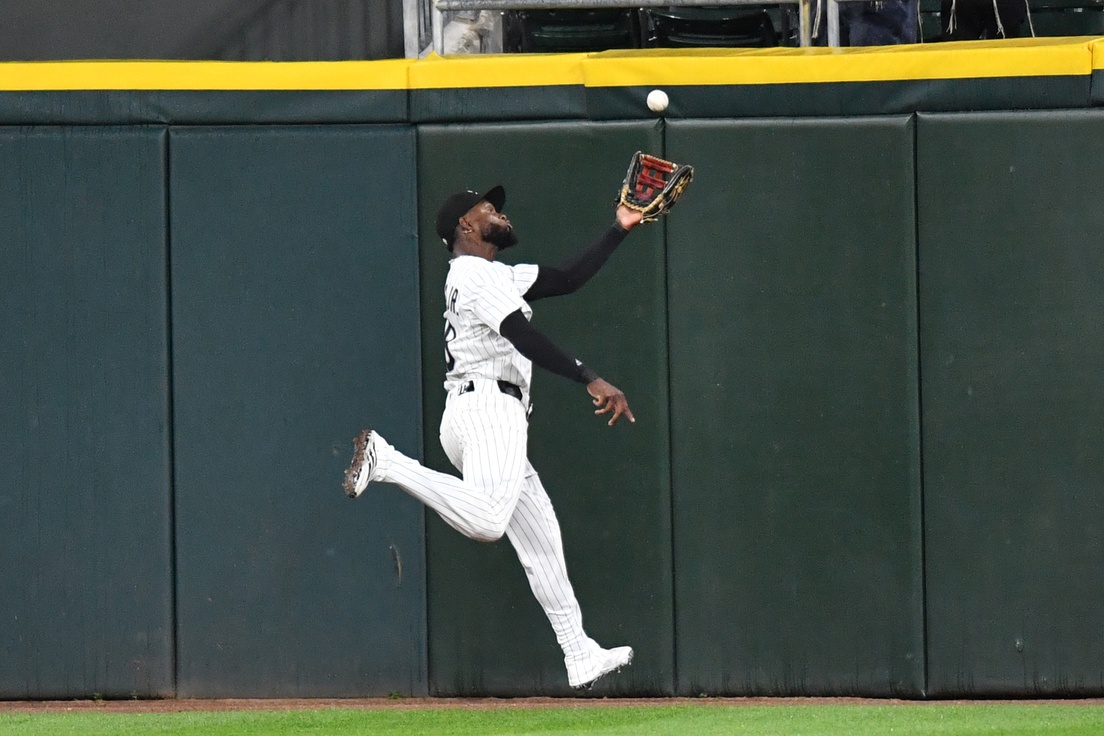 Luis Robert Jr. left Wednesday's White Sox game with an injury, possibly affecting trade talks.