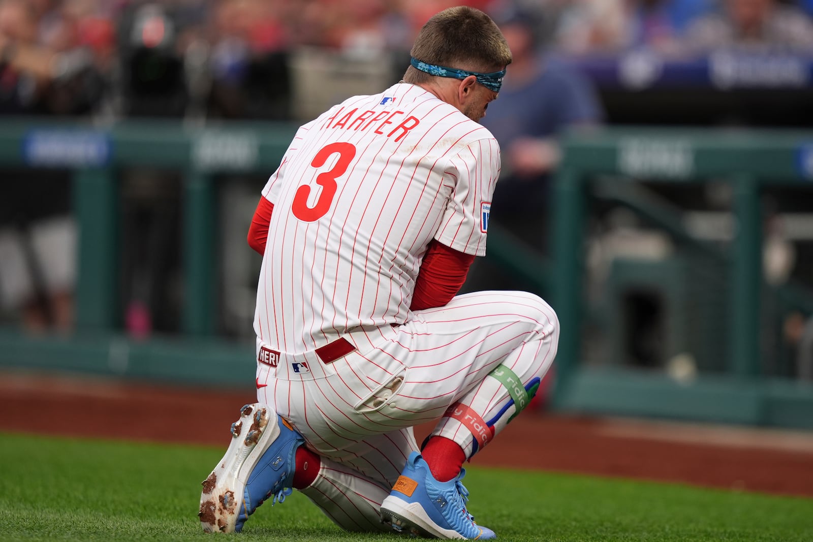FILE- Philadelphia Phillies' Bryce Harper reacts after being hit by a pitch from Atlanta Braves' Spencer Strider plays during a baseball game, Tuesday, May 27, 2025, in Philadelphia. (AP Photo/Matt Slocum)