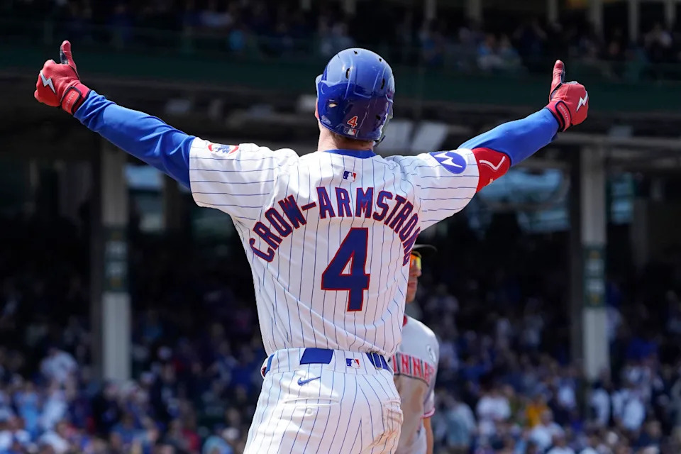 Chicago Cubs outfielder Pete Crow-Armstrong (4) gestures after hitting a one run single against the Cincinnati Reds during the third inning at Wrigley Field.David Banks-Imagn Images