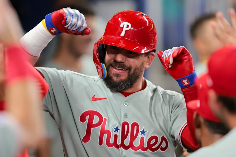 Philadelphia Phillies designated hitter Kyle Schwarber (12) celebrates with teammates after hitting a solo home run against the Miami Marlins during the eighth inning at loanDepot Park.Sam Navarro-Imagn Images