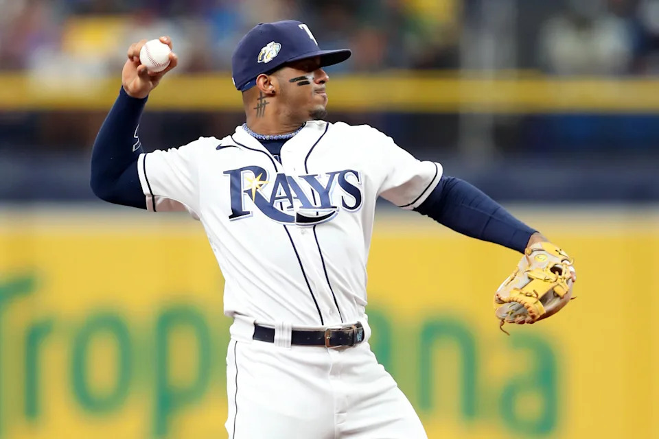 ST. PETERSBURG, FL - August 12: Tampa Bay Rays Shortstop Wander Franco (5) throws the ball over to first base during the MLB regular season game between the Cleveland Guardians and the Tampa Bay Rays on August 12, 2023, at Tropicana Field in St. Petersburg, FL. (Photo by Cliff Welch/Icon Sportswire via Getty Images)Icon Sportswire&sol;Getty Images