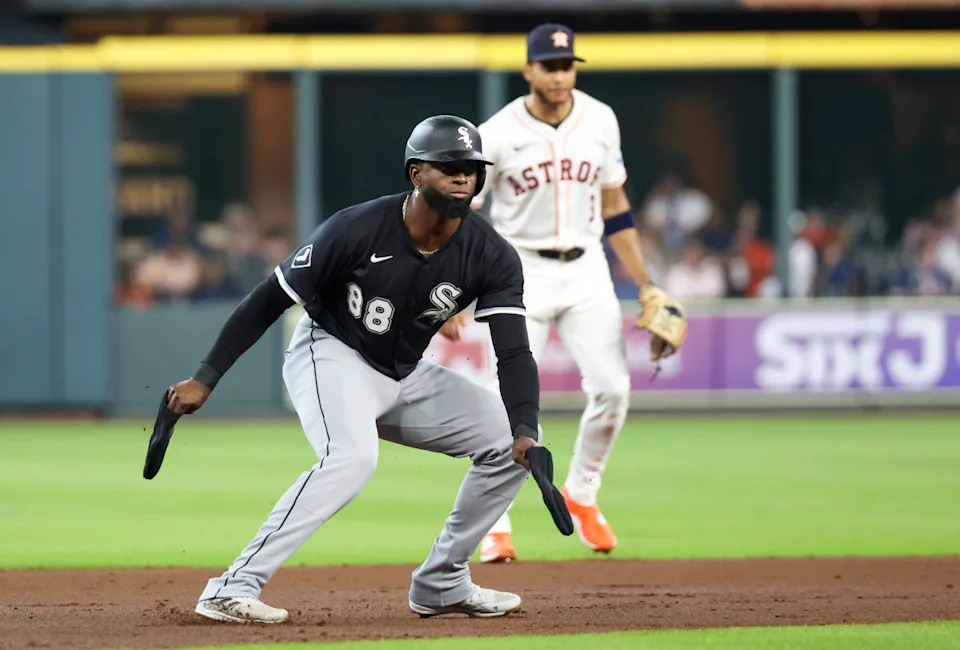 Chicago White Sox center fielder Luis Robert Jr. (88) reacts to his stand up double RBI against the Houston Astros in the first inning at Daikin Park.Thomas Shea-Imagn Images