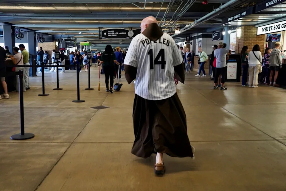 A friar wearing a Pope Leo-styled White Sox jersey walks around Rate Field, the Chicago White Sox ballpark, at an event celebrating the Chicago-born pontiff on June 14, 2025.