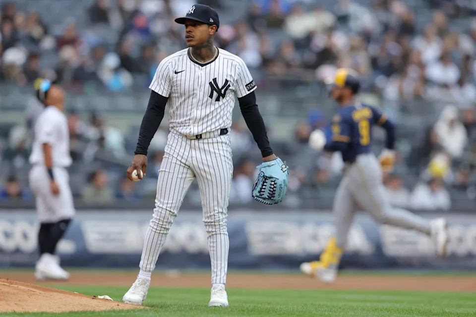 New York Yankees starting pitcher Marcus Stroman (0) reacts after allowing a two run home run to Milwaukee Brewers first baseman Jake Bauers (9) during the fourth inning at Yankee Stadium.Brad Penner-Imagn Images