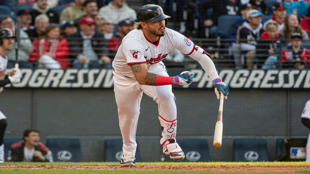 Cleveland Guardians' Jose Ramirez throws to first base but not in time to put out Los Angeles Angels' Logan O'Hoppe during the seventh inning of a baseball game, Friday, May 30, 2025, in Cleveland.