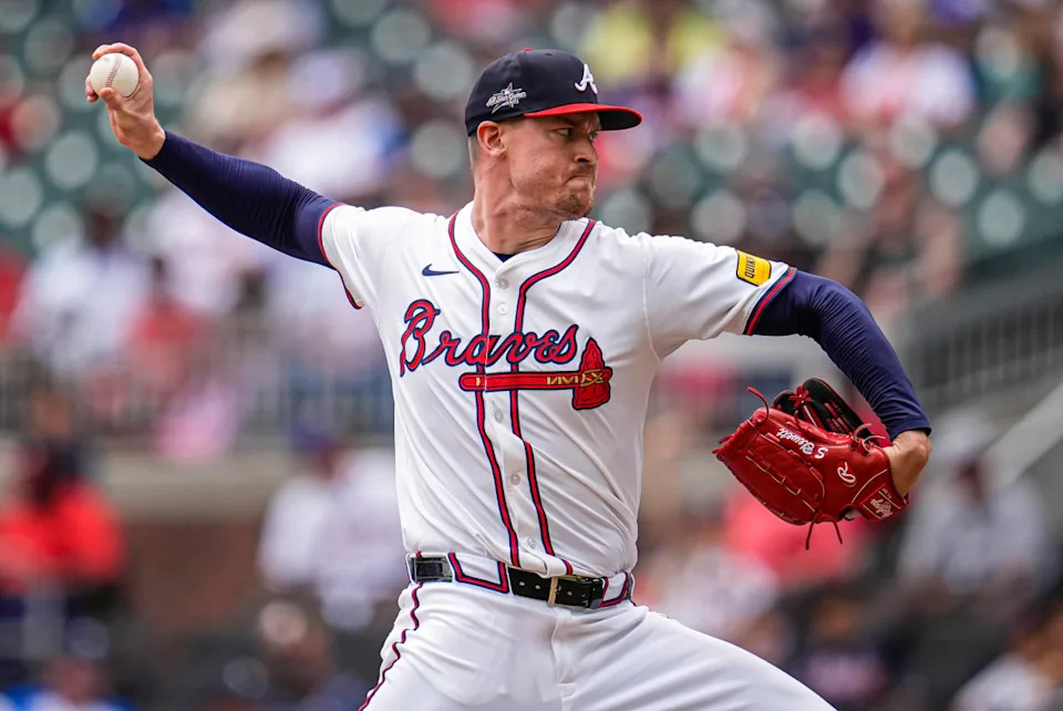 Former Atlanta Braves relief pitcher Scott Blewett (63) pitches at Truist Park.Dale Zanine-Imagn Images