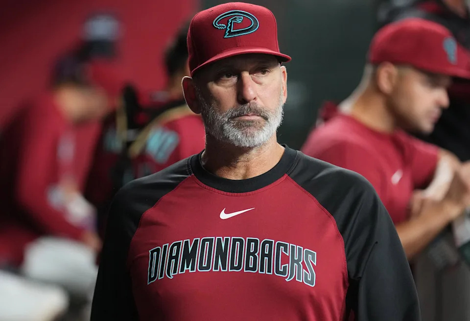 Arizona Diamondbacks manager Torey Lovullo watches his team from the dugout as they play the Seattle Mariners at Chase Field in Phoenix on June 10, 2025.