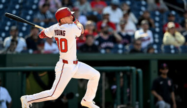 Young's return bumps Hassell to right field and Lile to Rochester