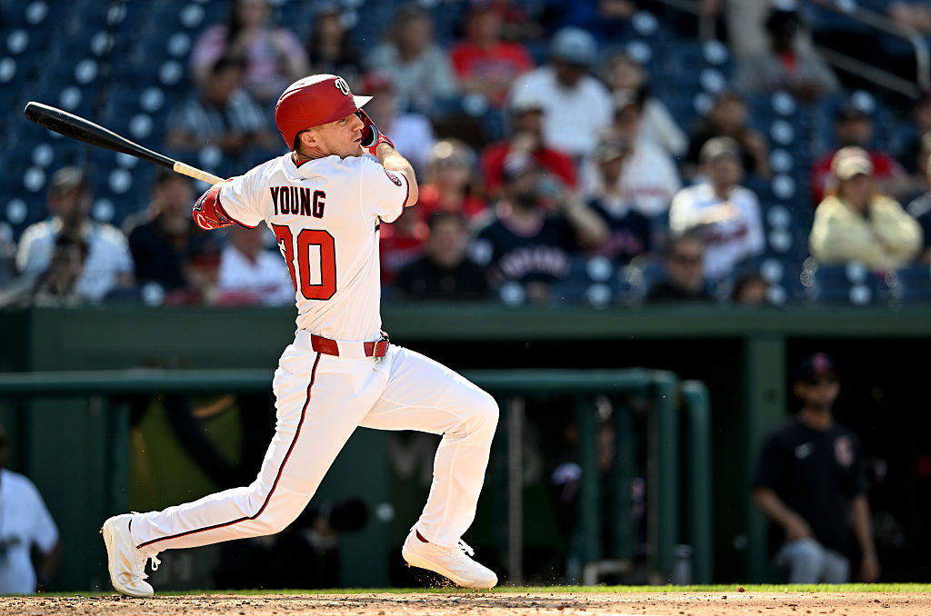 Young's return bumps Hassell to right field and Lile to Rochester