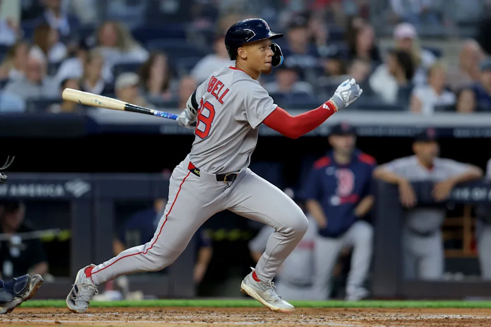 Boston Red Sox second baseman Kristian Campbell (28) follows through on an RBI single against the New York Yankees during the third inning at Yankee Stadium.Brad Penner-Imagn Images