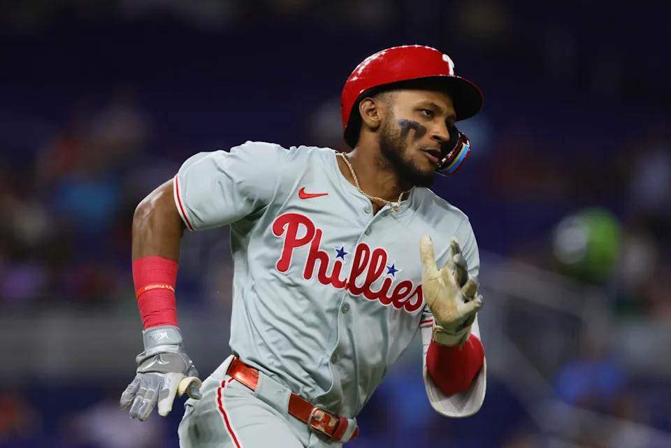  Philadelphia Phillies center fielder Johan Rojas (18) runs toward second base after hitting a double against the Miami Marlins during the second inning at loanDepot Park.Sam Navarro-Imagn Images