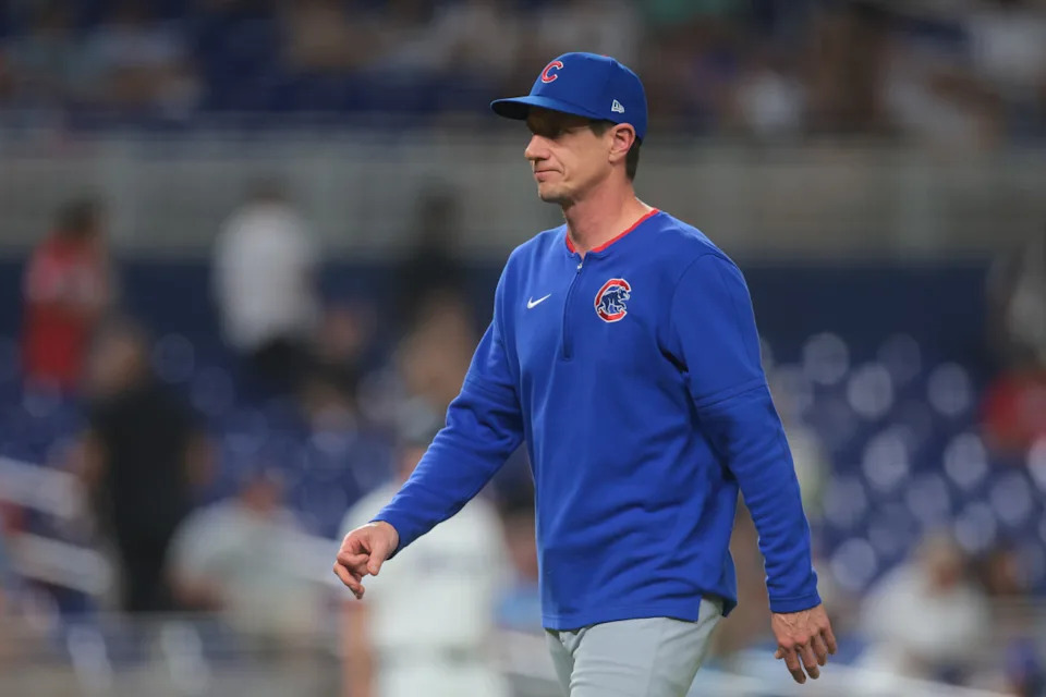 Chicago Cubs manager Craig Counsell (11) returns to the dugout after a pitching change against the Miami Marlins during the fifth inning at loanDepot Park.Sam Navarro-Imagn Images