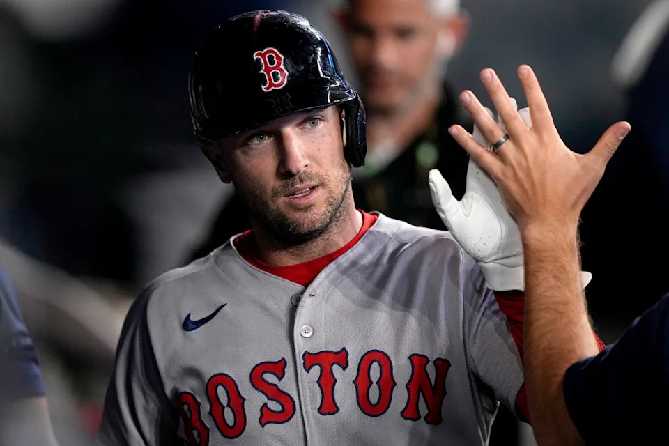 Boston Red Sox third baseman Alex Bregman (2) is congratulated after scoring against the Toronto Blue Jays during the ninth inning at Rogers Centre.John E&period; Sokolowski-Imagn Images