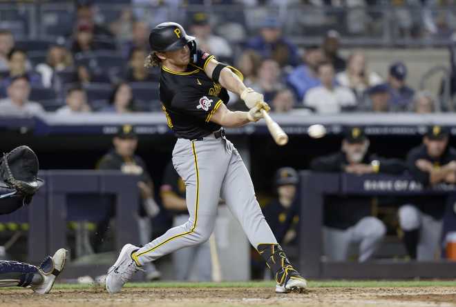 NEW YORK, NEW YORK - SEPTEMBER 27:  Billy Cook #28 of the Pittsburgh Pirates connects on a base hit in the eighth inning against the New York Yankees at Yankee Stadium on September 27, 2024 in New York City. (Photo by Jim McIsaac/Getty Images)