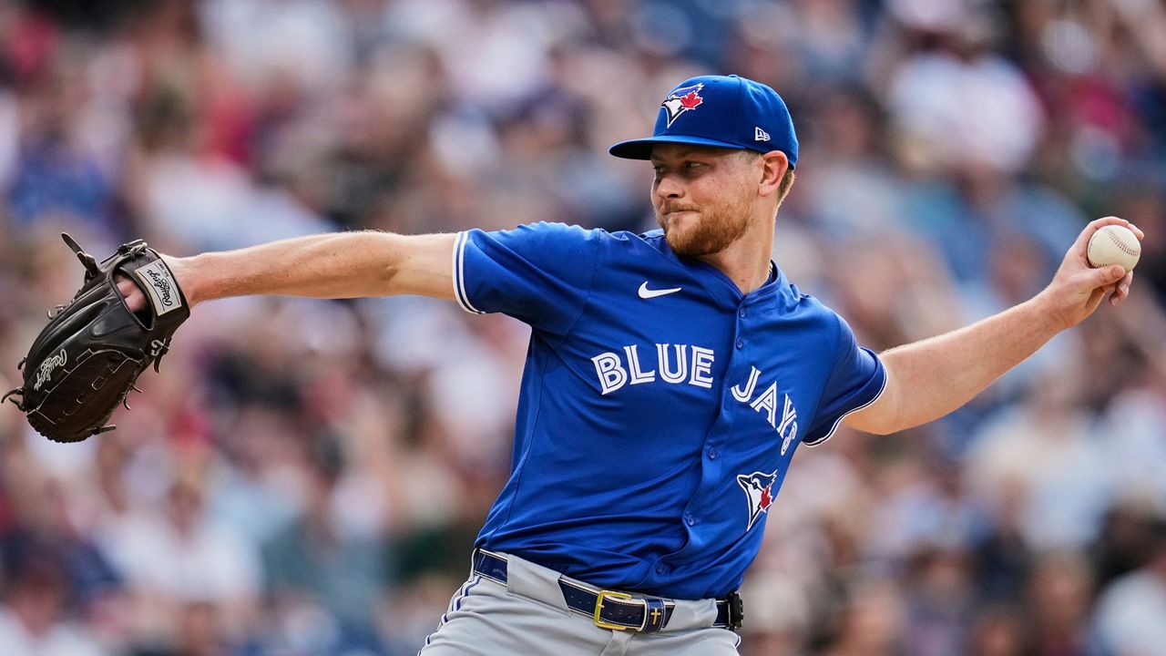 Toronto Blue Jays' Eric Lauer pitches in the first inning of a baseball game against the Cleveland Guardians in Cleveland, Tuesday, June 24, 2025. (AP Photo/Sue Ogrocki)