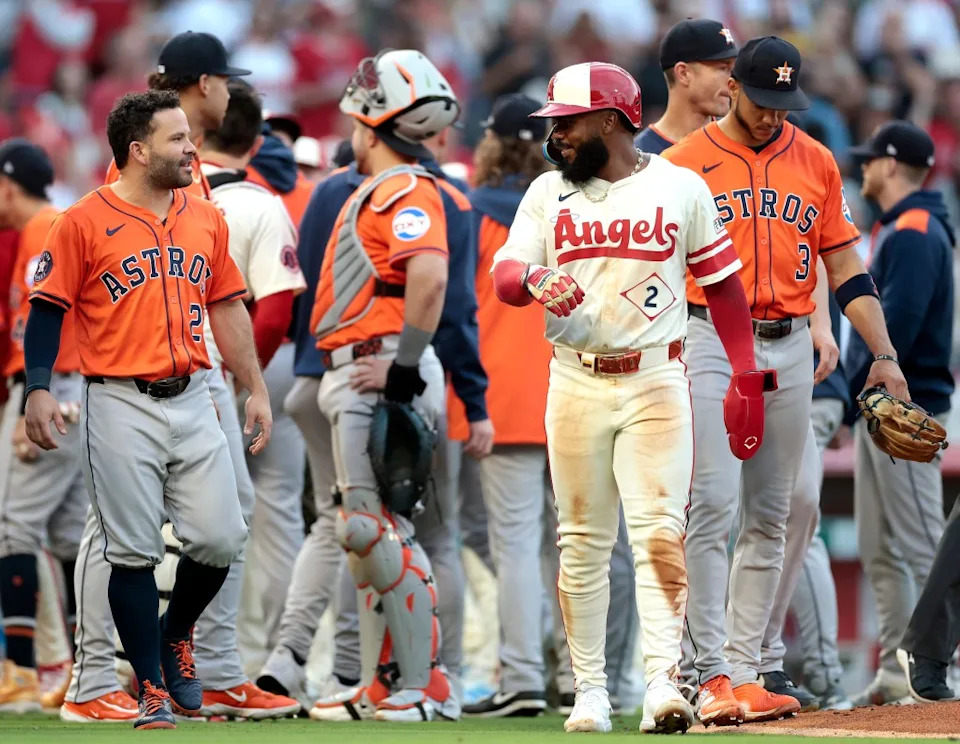 Jose Altuve #27 of the Houston Astros talks with Luis Rengifo #2 of the Los Angeles Angels after benches cleared when Zach Neto #9 of the Los Angeles Angels was hit by a pitch in the third inning at Angel Stadium of Anaheim on June 20, 2025 in Anaheim, California. Getty Images