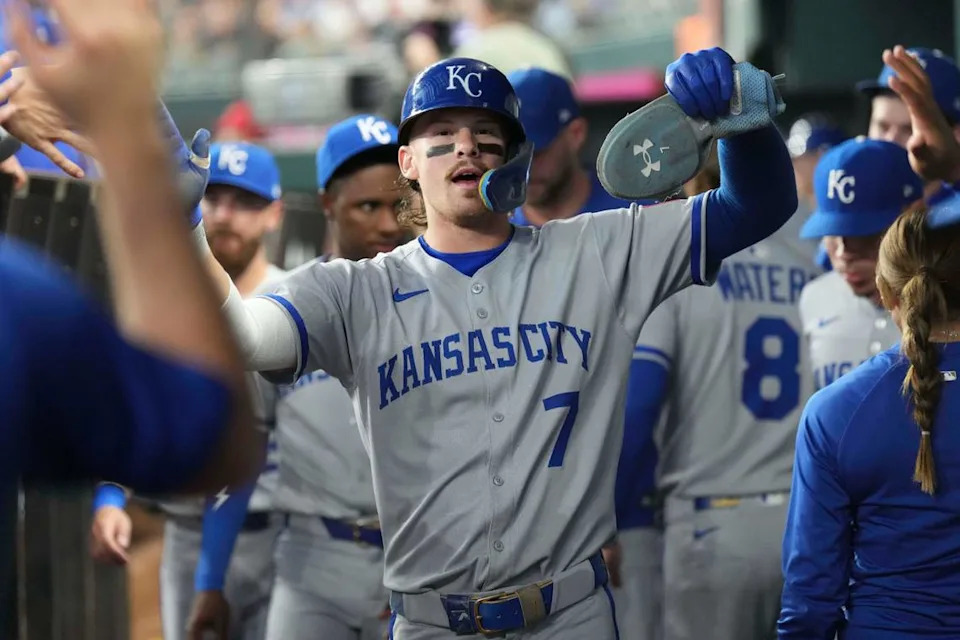 Kansas City Royals shortstop Bobby Witt Jr. (7) celebrates with teammates in the dugout after scoring a run against the Texas Rangers during the first inning at Globe Life Field on June 17, 2025.