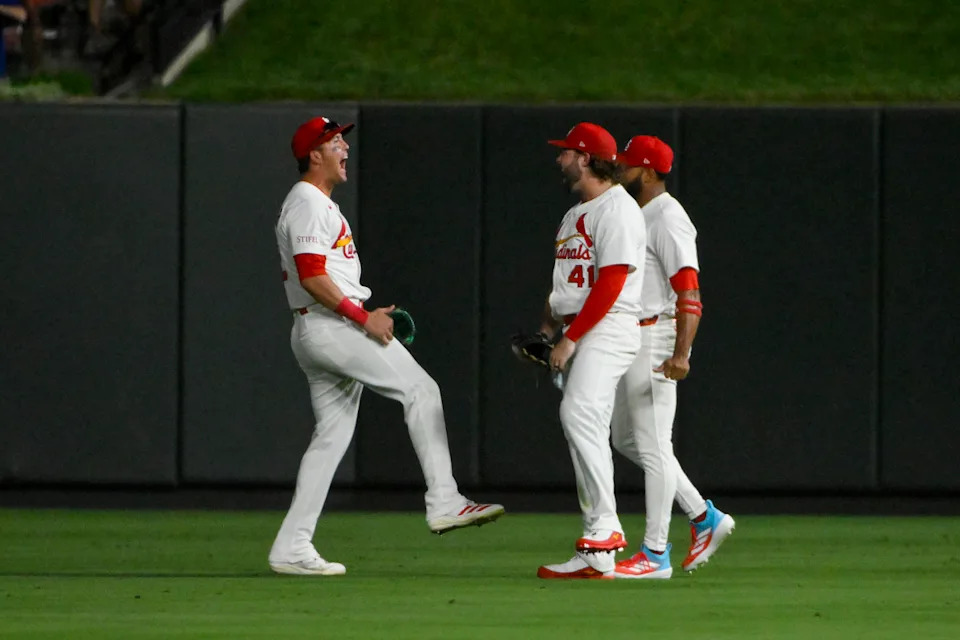 Cardinals outfielders Lars Nootbaar, Alec Burleson, and Victor Scott II celebrate a win.Jeff Curry-Imagn Images