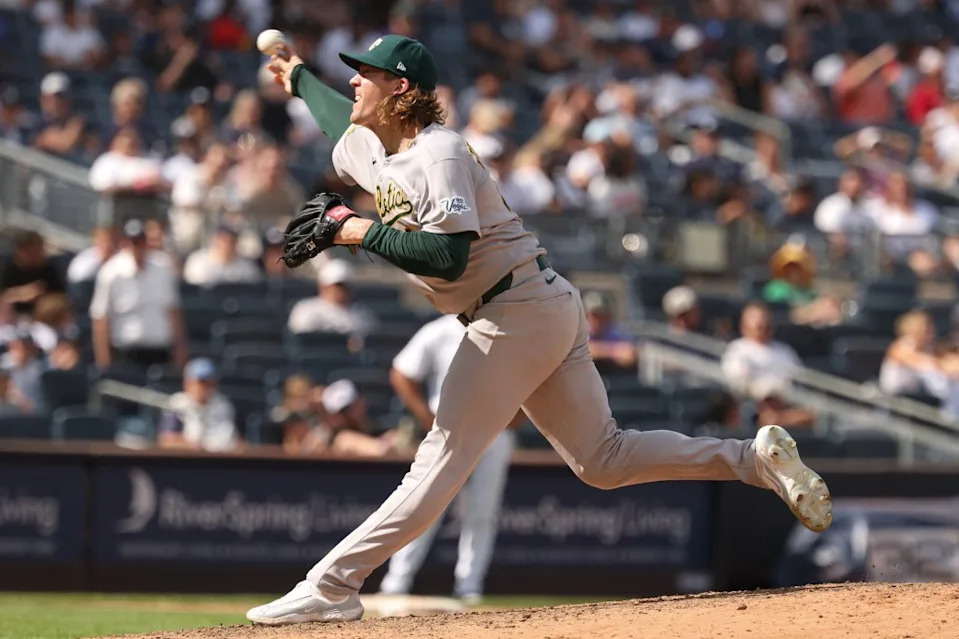 Athletics pitcher Tyler Ferguson (44) delivers a pitch during the seventh inning against the New York Yankees at Yankee Stadium. IMAGN IMAGES via Reuters Connect