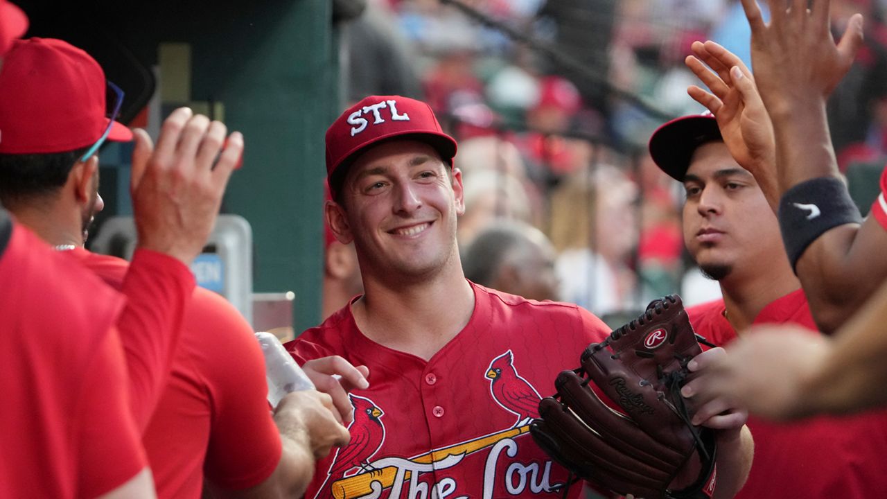 St. Louis Cardinals starting pitcher Andre Pallante smiles in the dugout after being removed during the seventh inning of a baseball game against the Cincinnati Reds Friday, June 20, 2025, in St. Louis.