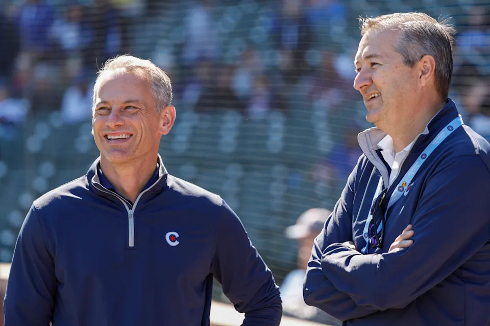 Chicago Cubs President of baseball operations Jed Hoyer (L) smiles next to Chicago Cubs Chairman Tom Ricketts (R).Kamil Krzaczynski-Imagn Images