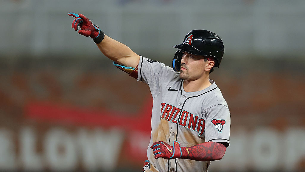 Diamondbacks' Corbin Carroll celebrates after a hit...