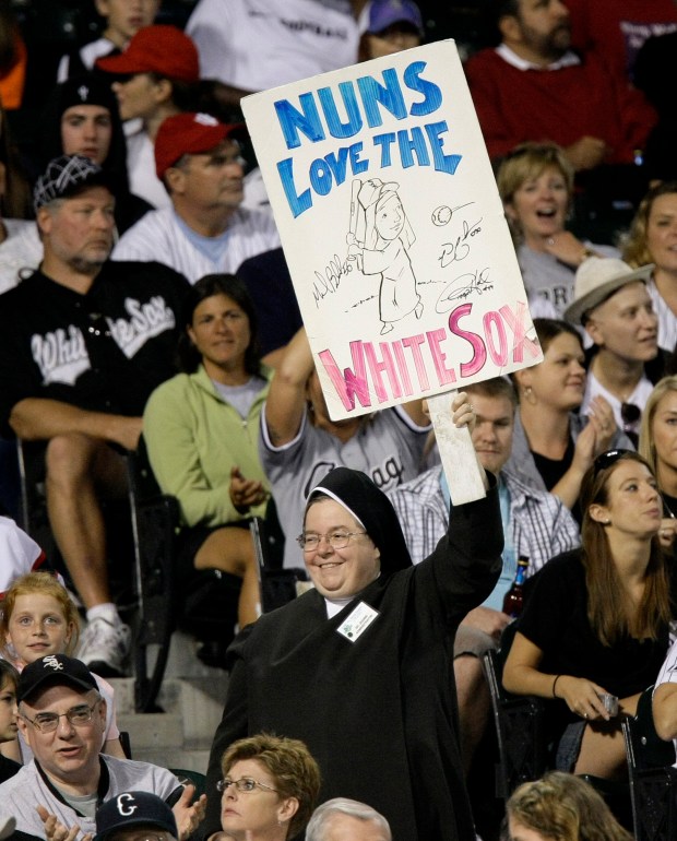 Sr. Jeanne Haley shows her support for the Chicago White Sox during the eighth inning of their game against the Cleveland Indians in Chicago on Sept. 27, 2008. The White Sox lost 12-6. (Charles Rex Arbogast/AP)