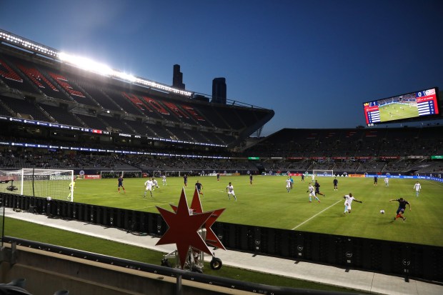 The Chicago Fire set up their second goal of the game in the first half of the Fire's season opener against the New England Revolution at Soldier Field on April 17, 2021. (Chris Sweda/Chicago Tribune)