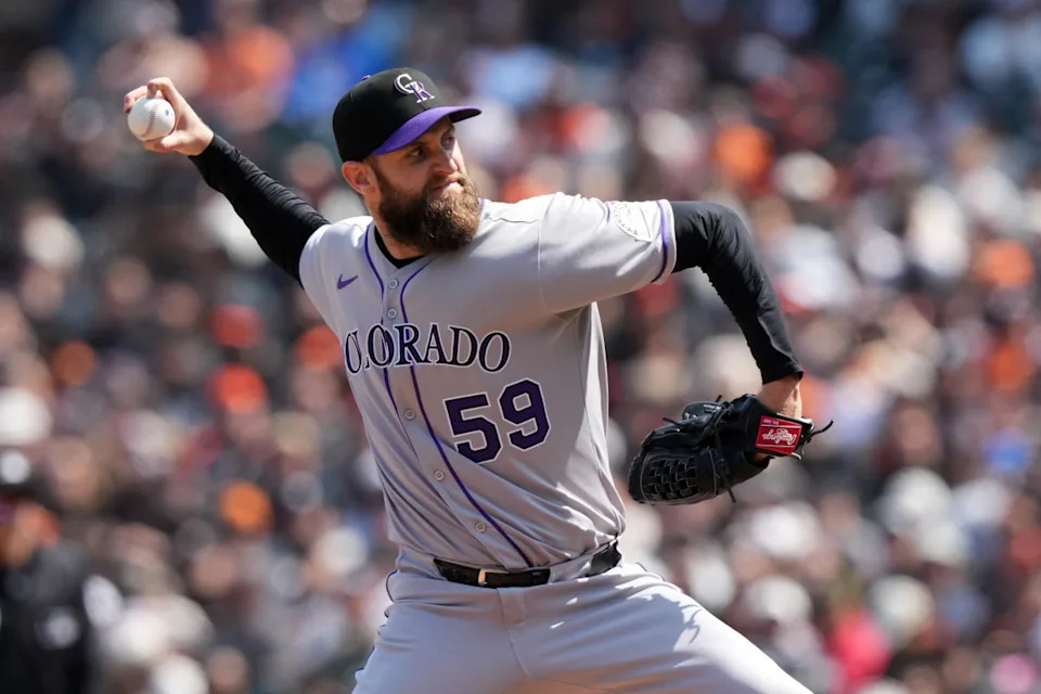 Colorado Rockies relief pitcher Jake Bird (59) throws a pitch against the San Francisco Giants during the seventh inning at Oracle Park.Darren Yamashita-Imagn Images