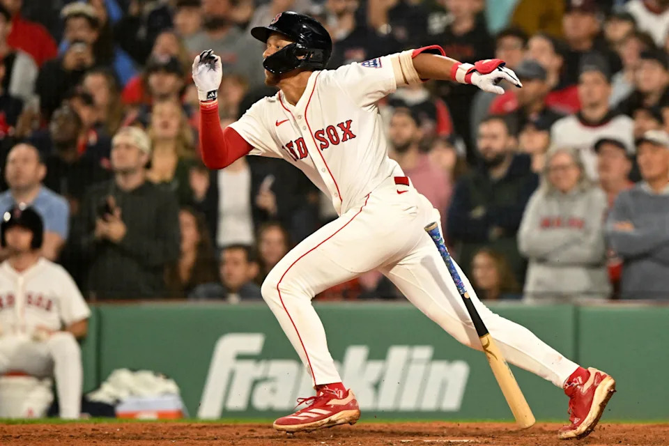 Boston Red Sox second baseman Kristian Campbell (28) hits a RBI against the Tampa Bay Rays during the ninth inning at Fenway Park.Brian Fluharty-Imagn Images