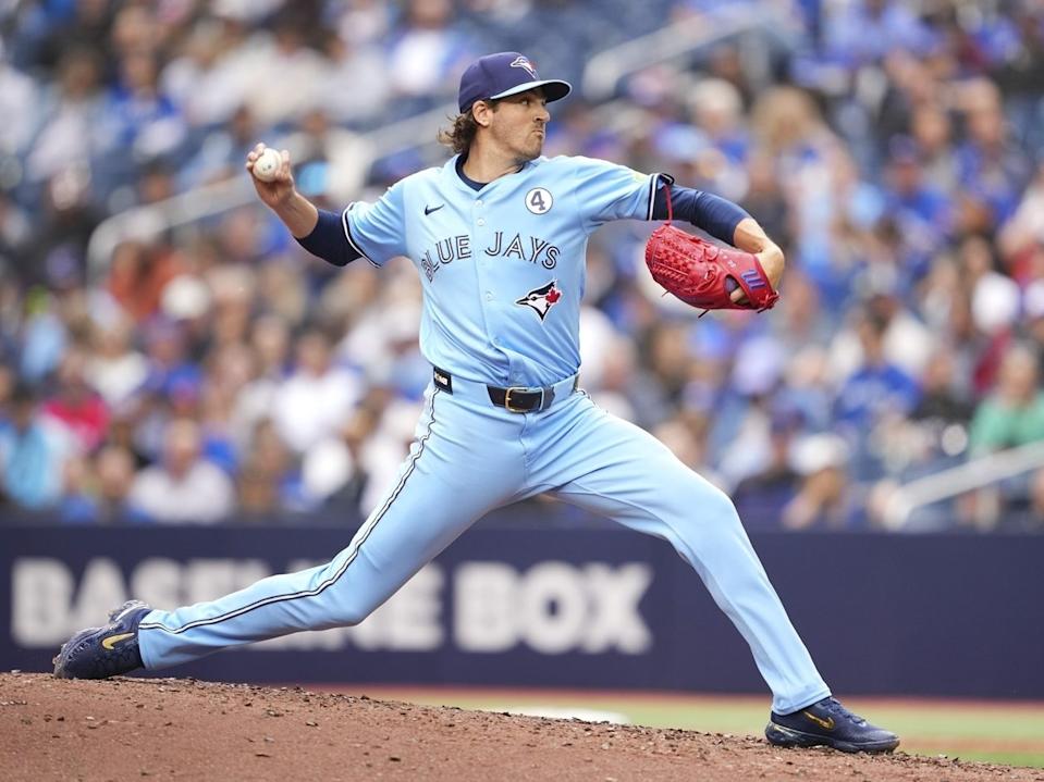  Kevin Gausman of the Toronto Blue Jays delivers a pitch during the third inning against the Athletics in their MLB game at the Rogers Centre on Sunday, June 1, 2025, in Toronto.