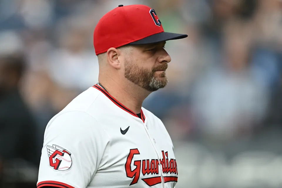 Jun 9, 2025; Cleveland, Ohio, USA; Cleveland Guardians manager Stephen Vogt (12) walks back to the dugout after a pitching change during the fifth inning against the Cincinnati Reds at Progressive Field. Mandatory Credit: Ken Blaze-Imagn Images