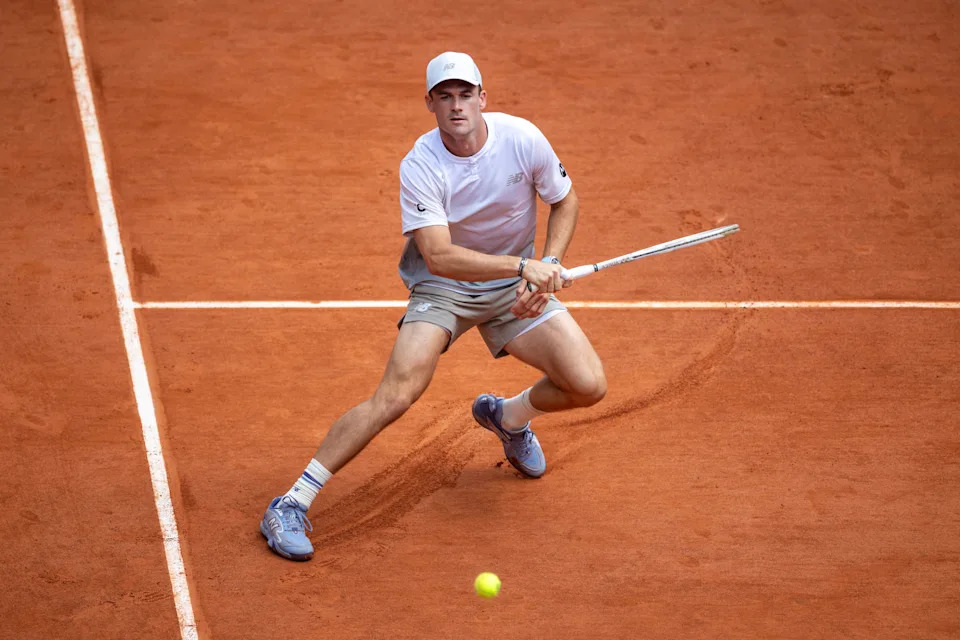 Tommy Paul will have his work cut out for him today against the defending champion. (Tim Clayton/Getty Images)