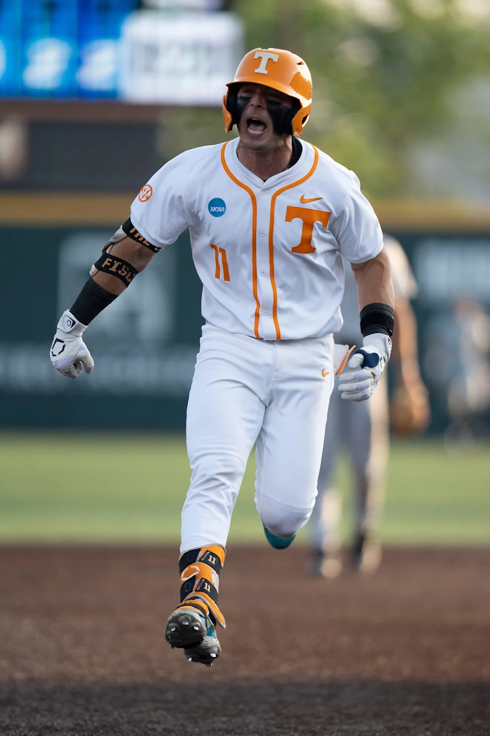 Tennessee's Andrew Fischer celebrates after hitting a home run in the regionals against Wake Forest.