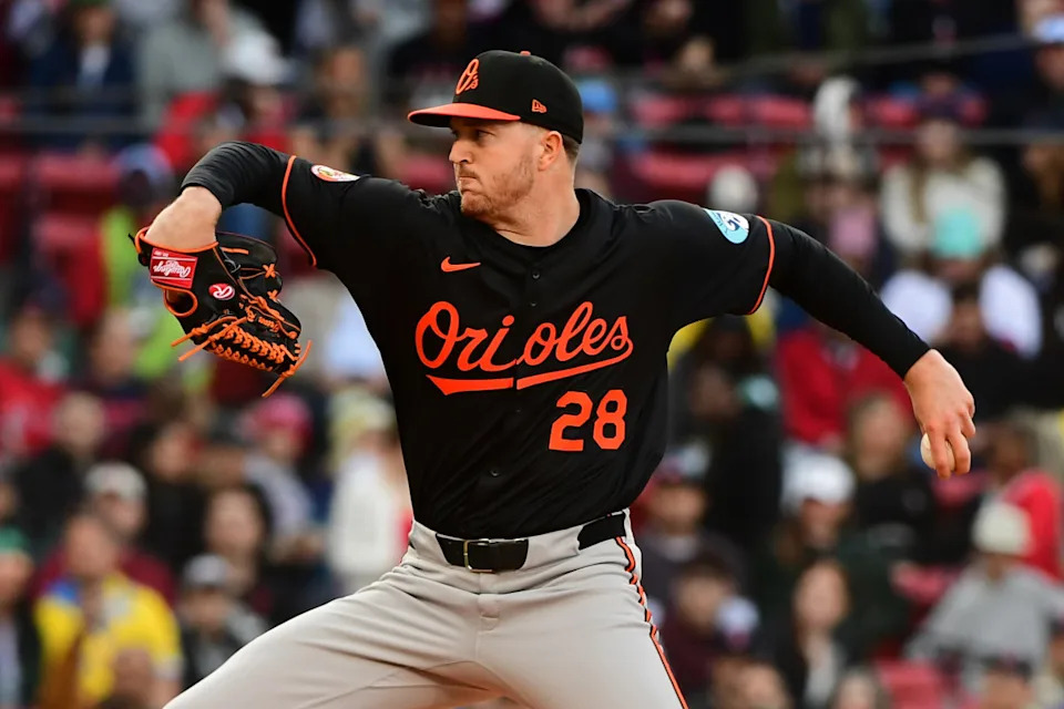 May 24, 2025; Boston, Massachusetts, USA; Baltimore Orioles starting pitcher Trevor Rogers (28) pitches during the first inning against the Boston Red Sox at Fenway Park. © Bob DeChiara-Imagn Images