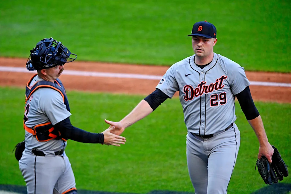 Tigers pitcher Tarik Skubal and catcher Jake Rogers celebrate after the last out of the third inning against the Guardians in Game 2 of the ALDS, Oct. 7, 2024, in Cleveland.
