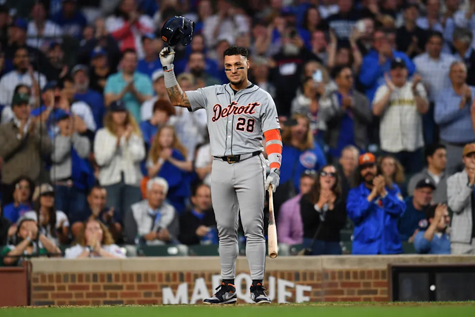 Detroit Tigers shortstop Javier Baez (28) reacts to his standing ovation for his first game back at Wrigley Field during the second inning in a game against the Chicago Cubs.Patrick Gorski-Imagn Images
