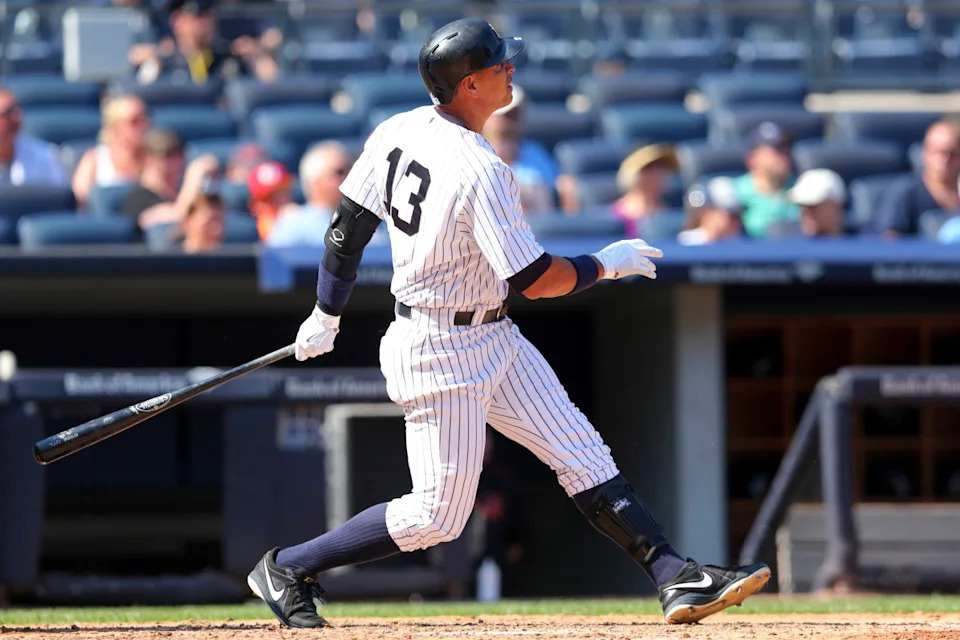 Former New York Yankees slugger ALex Rodriguez follows through on a solo home run at Yankee Stadium in September 2015. © Brad Penner-Imagn Images
