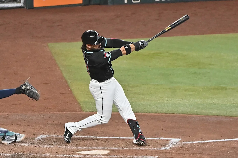 Arizona Diamondbacks third baseman Eugenio Suarez (28) hits a grand slam home run in the sixth inning against the Seattle Mariners at Chase Field in Phoenix on June 11, 2025.
