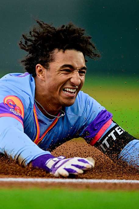 DENVER, CO - JUNE 6: Colorado Rockies shortstop Ryan Ritter (8) slides after hitting a triple for his first Major League hit in his debut in the fifth inning during a game between the New York Mets and the Colorado Rockies at Coors Field on June 6, 2025 in Denver, Colorado. (Photo by Dustin Bradford/Icon Sportswire via Getty Images)