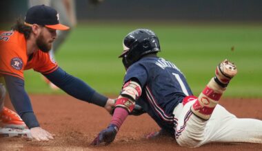 Houston Astros second baseman Brendan Rodgers, left, tags out Cleveland Guardians' Angel Martinez (1) at second base in the first inning of a baseball game in Cleveland, Friday, June 6, 2025.