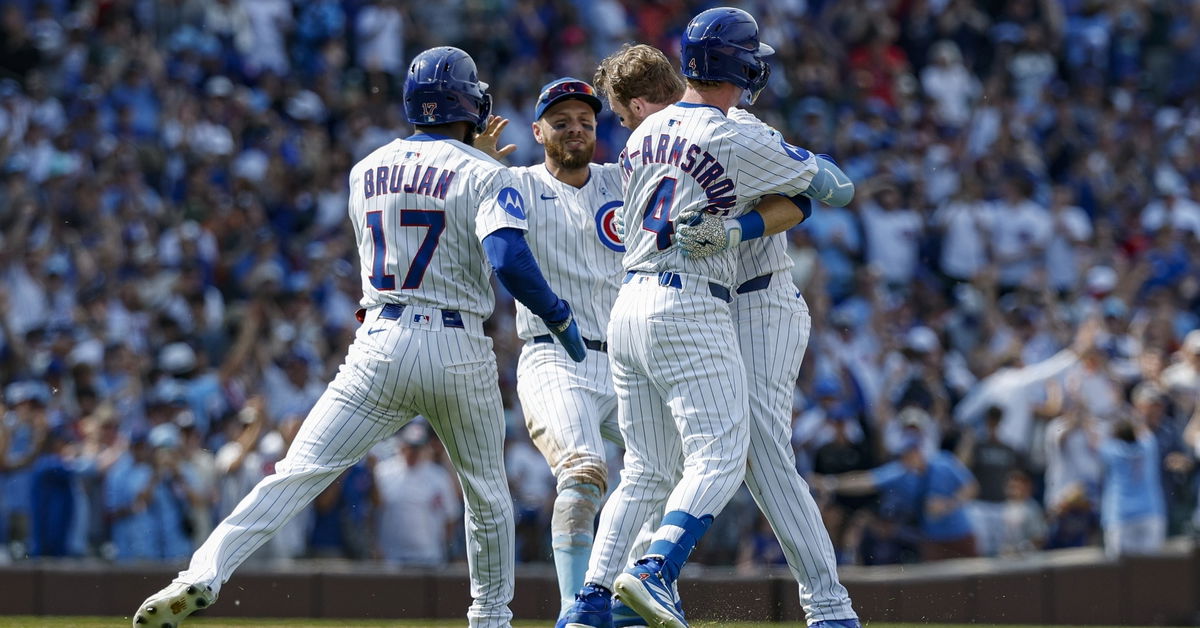Cubs News: Game Recap: Happ delivers in extras for Father's Day walk-off