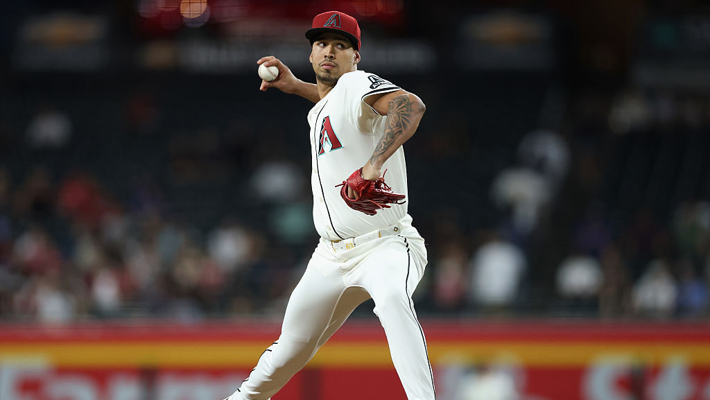 Relief pitcher Justin Martinez #63 of the Arizona Diamondbacks pitches against the Seattle Mariners...