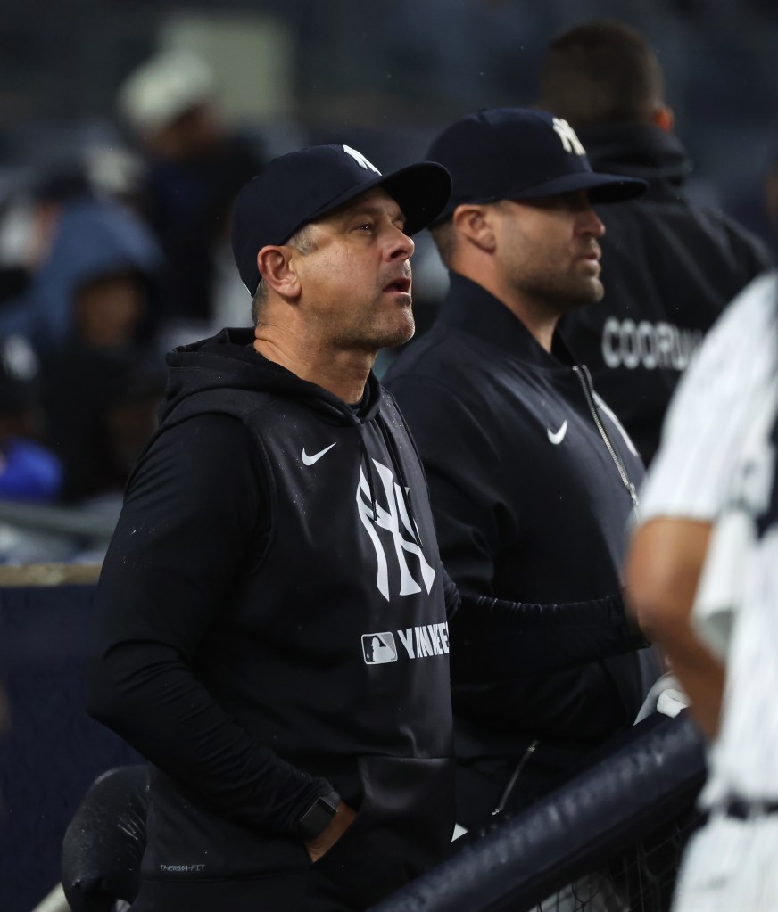 New York Yankees manager Aaron Boone in the dugout.