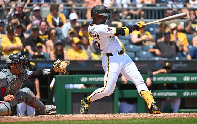 PITTSBURGH, PENNSYLVANIA - JUNE 11: Andrew McCutchen #22 of the Pittsburgh Pirates hits a three run home run in the fifth inning during the game against the Miami Marlins at PNC Park on June 11, 2025 in Pittsburgh, Pennsylvania. (Photo by Justin Berl/Getty Images)