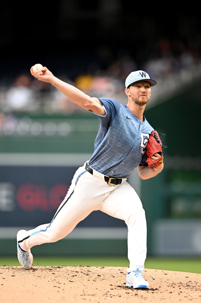 Baseball pitcher throwing a ball.