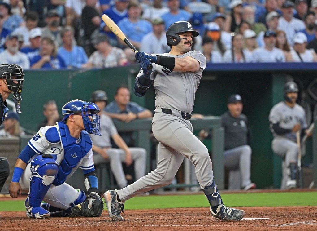 Yankees catcher Austin Wells hits a two-run double against the Royals on June 10, 2025.