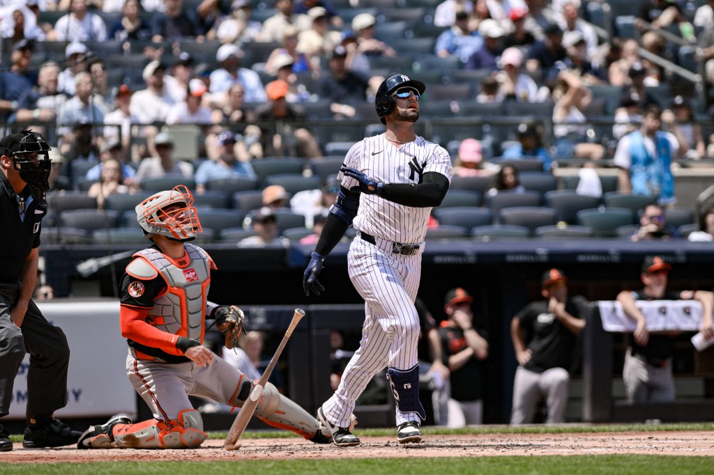New York Yankees player J.C. Escarra hitting a home run.
