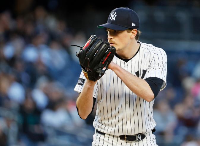 New York Yankees starting pitcher Max Fried throws to the Kansas City Royals.